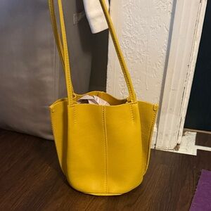 ‘almost perfect’ devan bucket tote portland leather bag